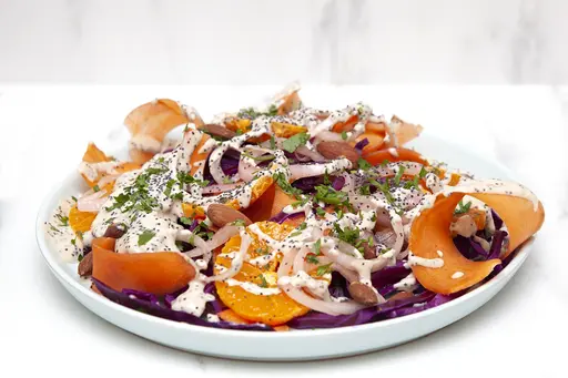 Clementine, smoked almond and pickled onion salad